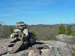 Cairn on rock outcrop. Photo by Daniel Chazin.