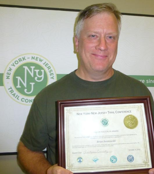 Brian Sniatkowski honored for trails service. Photo by Bob Jonas.